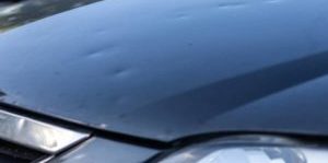 hail damage on a car in des moines - Paintless Dent Removal