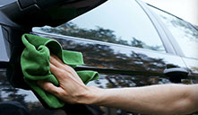 polishing a car